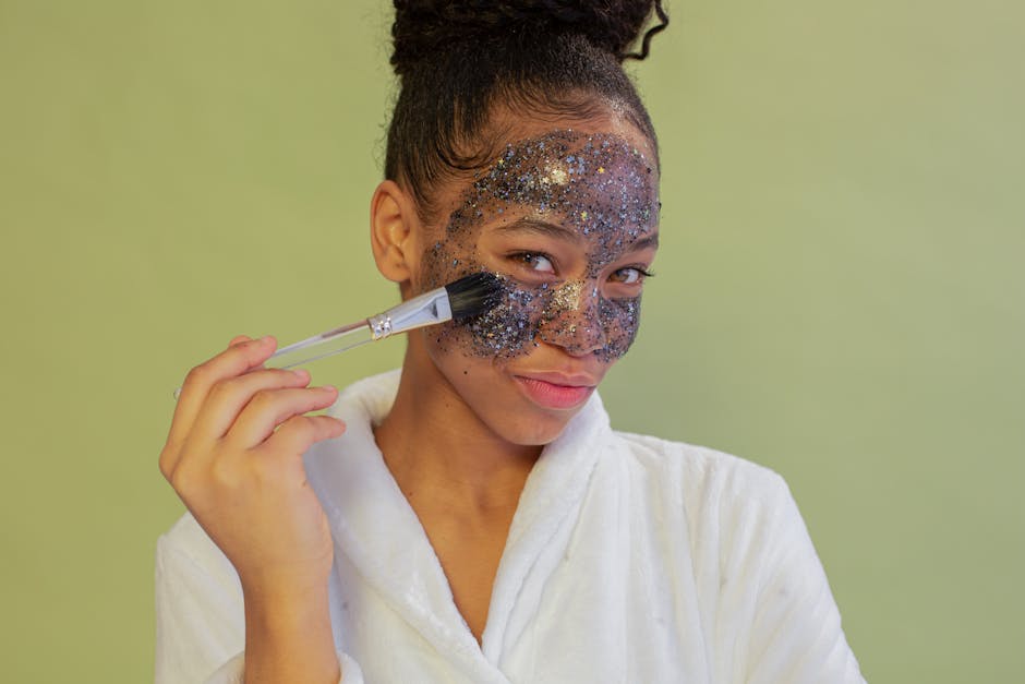 Woman brushing on a skincare face mask